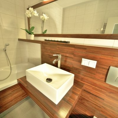 Nowoczesne wnętrze łazienki z wykorzystaniem blatów z akacji
